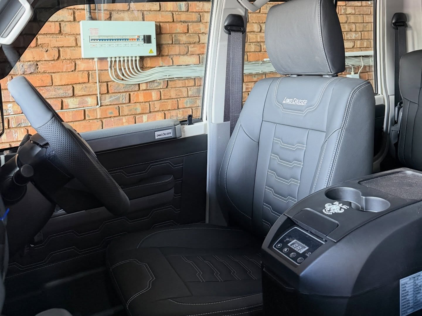 Trimmed cabin with custom console and Dometic fridge